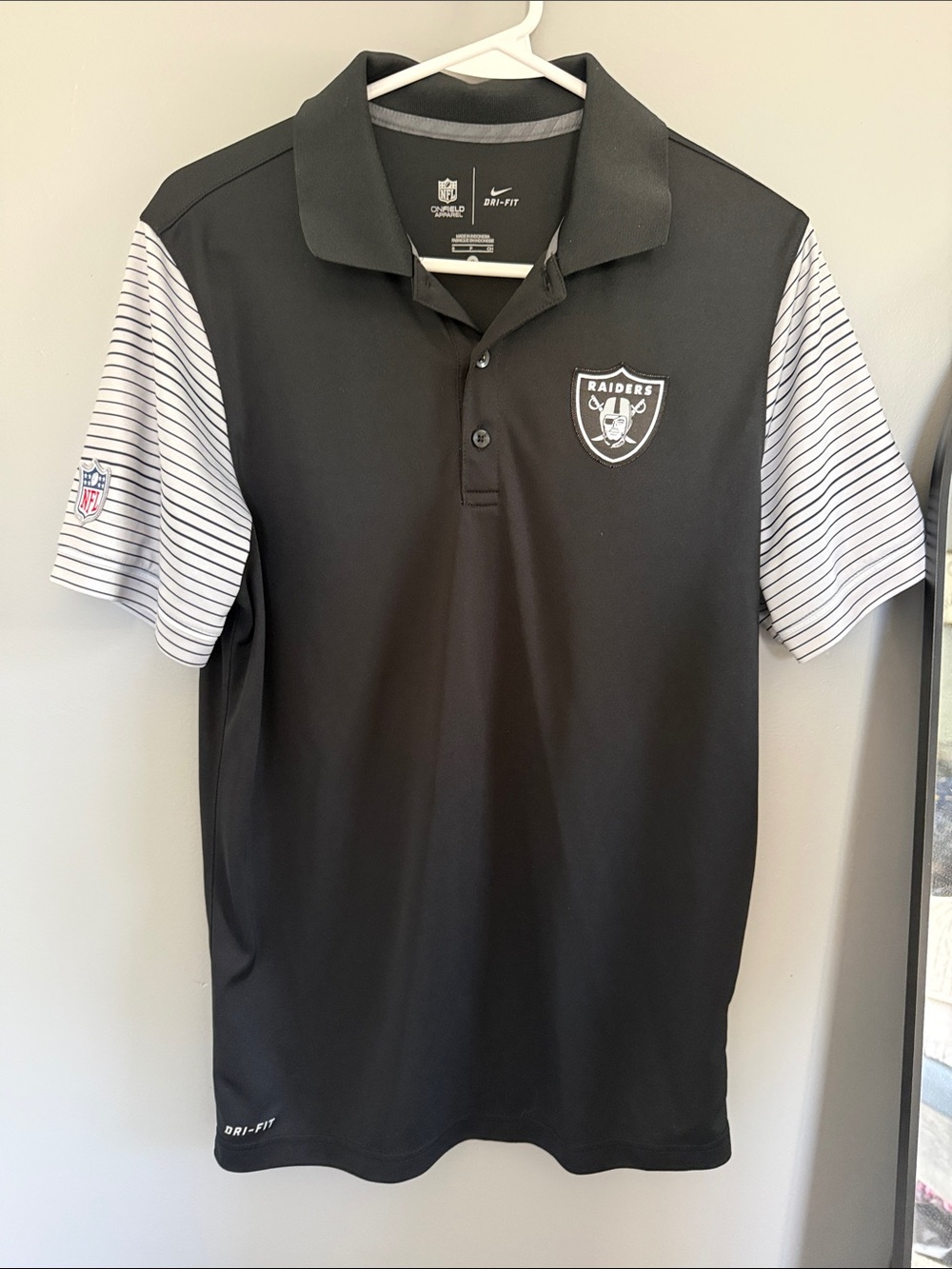 Nike Black Raiders Polo with White Striped Sleeves